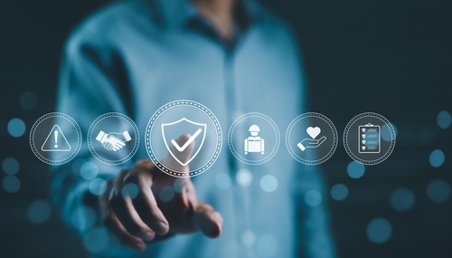 Photo showing a person touching a symbol with a checkmark denoting regulatory compliance